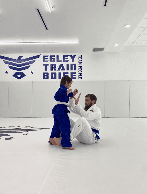 Our kids mixed martial arts training, which includes Brazilian Jiu-Jitsu, Muay Thai, boxing, and kung fu, teaches self-control, self-defense techniques, grappling techniques, and the gentle art, enhancing mental focus, motor skills, and allowing children to progress at their own pace.