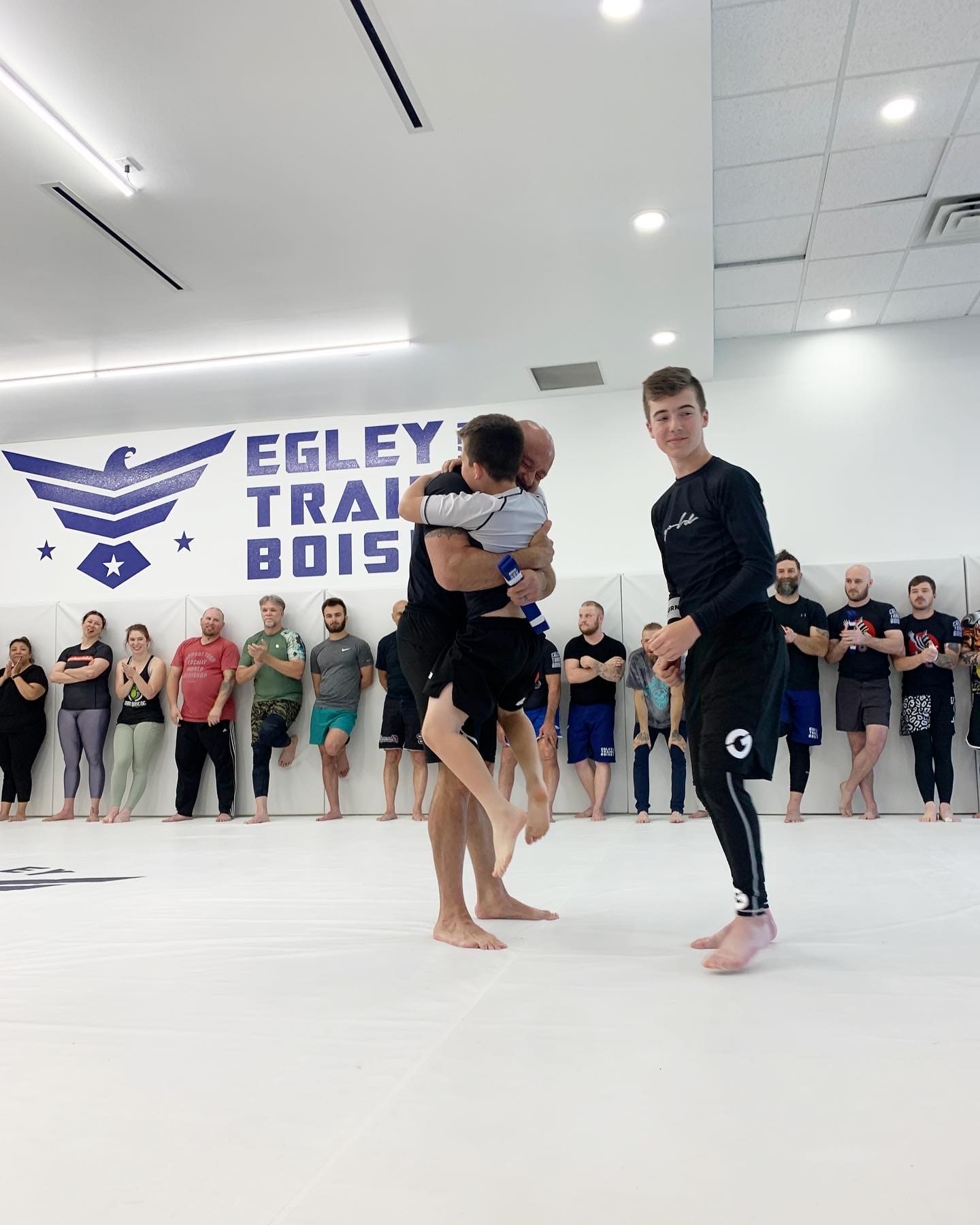 Martial arts training fosters self-control, self-defense, and social skills, teaching students to resist opponents with the same respect and focus as a black belt, while grappling and fighting under the guidance of skilled instructors to improve their abilities.